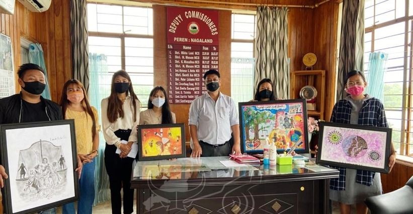 DC Peren Sentiwapang Aier, NCS with the winners of the painting competition based on the theme ‘imagining a gender-equal world’ held at DC’s office chamber, Peren on July 15. (DIPR Photo)